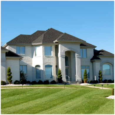 Exterior of brick home in Frisco by Platinum Painting