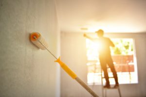 professional painter painting the inside of a house