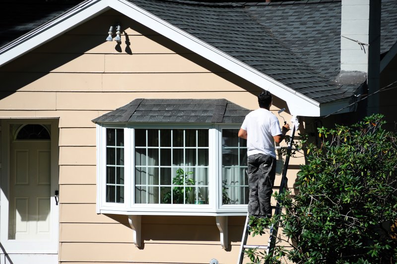 man exterior painting