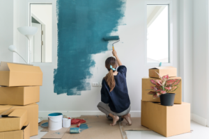 a person painting the interior of their home